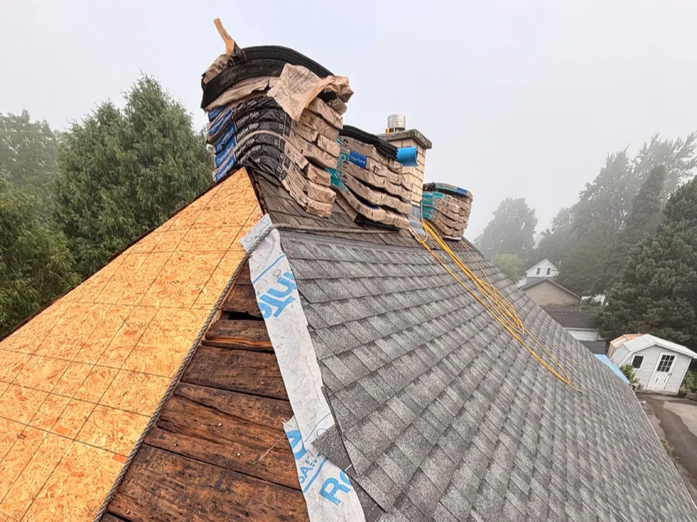 Gabled roof with shingles by Elgin Roofing